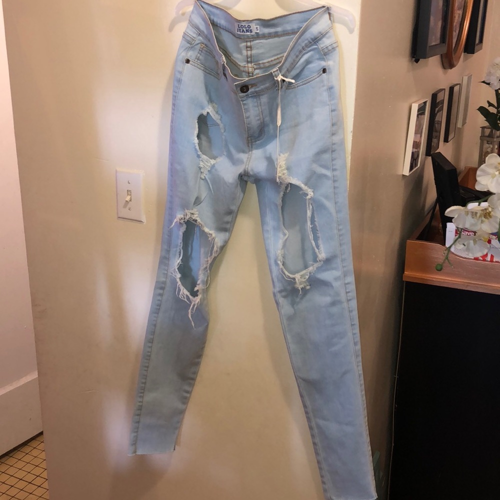 Brand new cut up boyfriend jeans